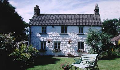 The garden is sheltered and fenced for the safety of children and pets