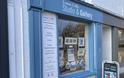 Louise Collis  Studio & Gallery shop in Abergavenny blue painted wooden window frame with artwork in window