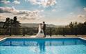 Loveseen photography captured wedding couple by swimming pool at Caer Llan in Monmouthshire