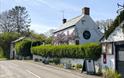 The Halfway at Tal-y-coed at the side of a country road with hedge in rural setting in monmouthshire