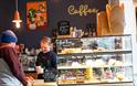 Little Green Refills - The Coffee House lady pours fresh coffee with baked cakes and food