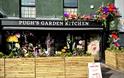 The Garden Kitchen By Pugh's shop front in Abergavenny pretty flowers and window display