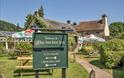 The Anchor Inn sign post in tintern