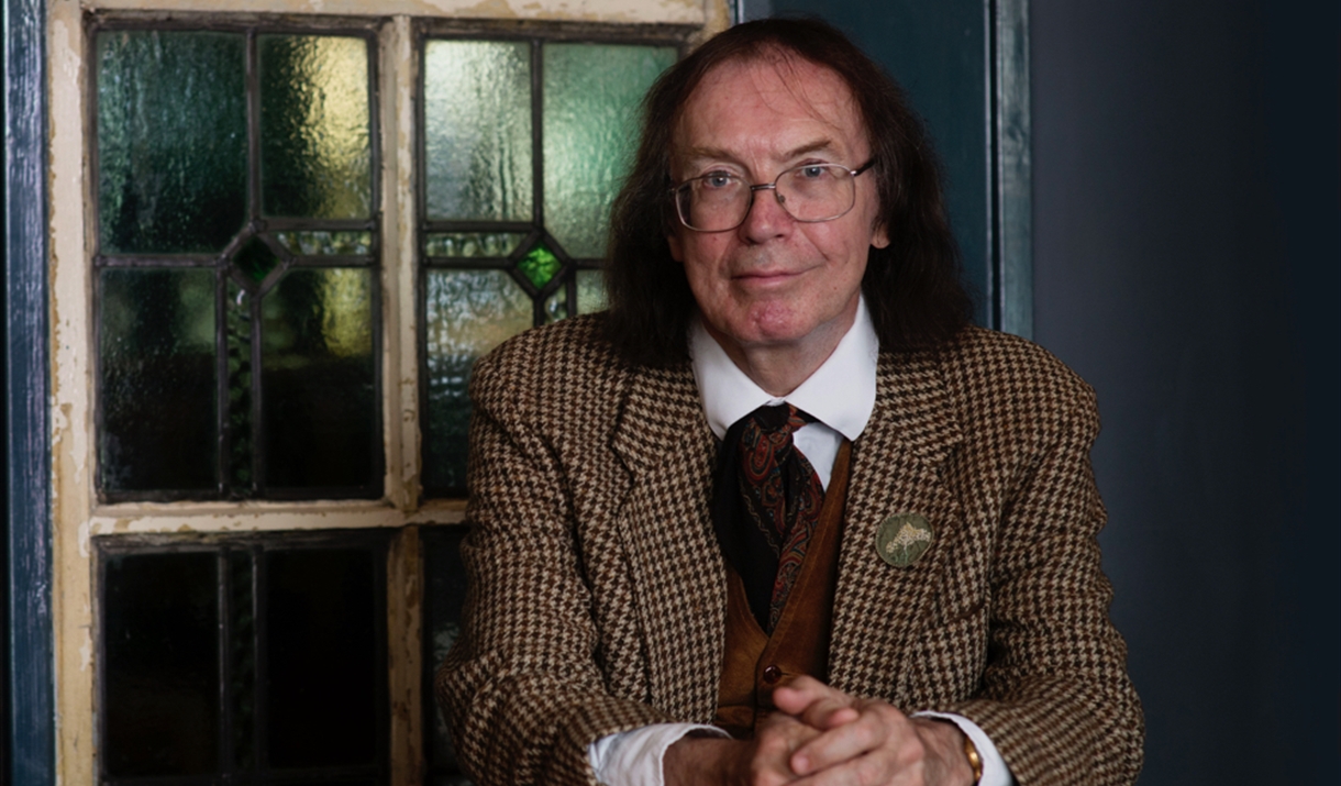 Professor Hutton sat at Table