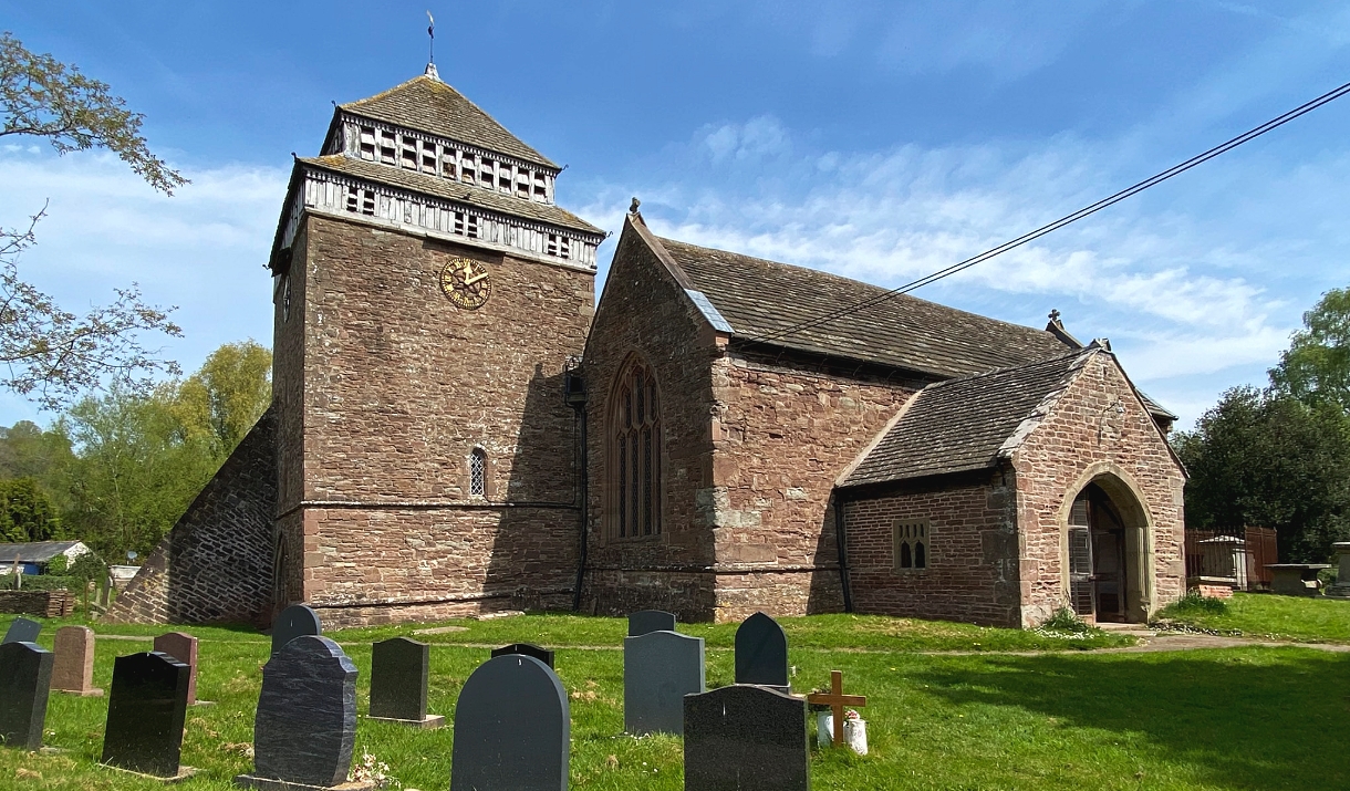 St Bridget's Church Skenfrith on a sunny day in the village of Skenfrith