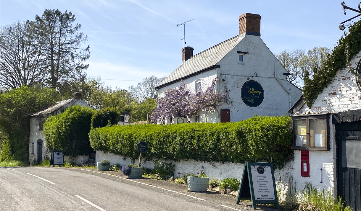 The Halfway at Tal-y-coed at the side of a country road with hedge in rural setting in monmouthshire