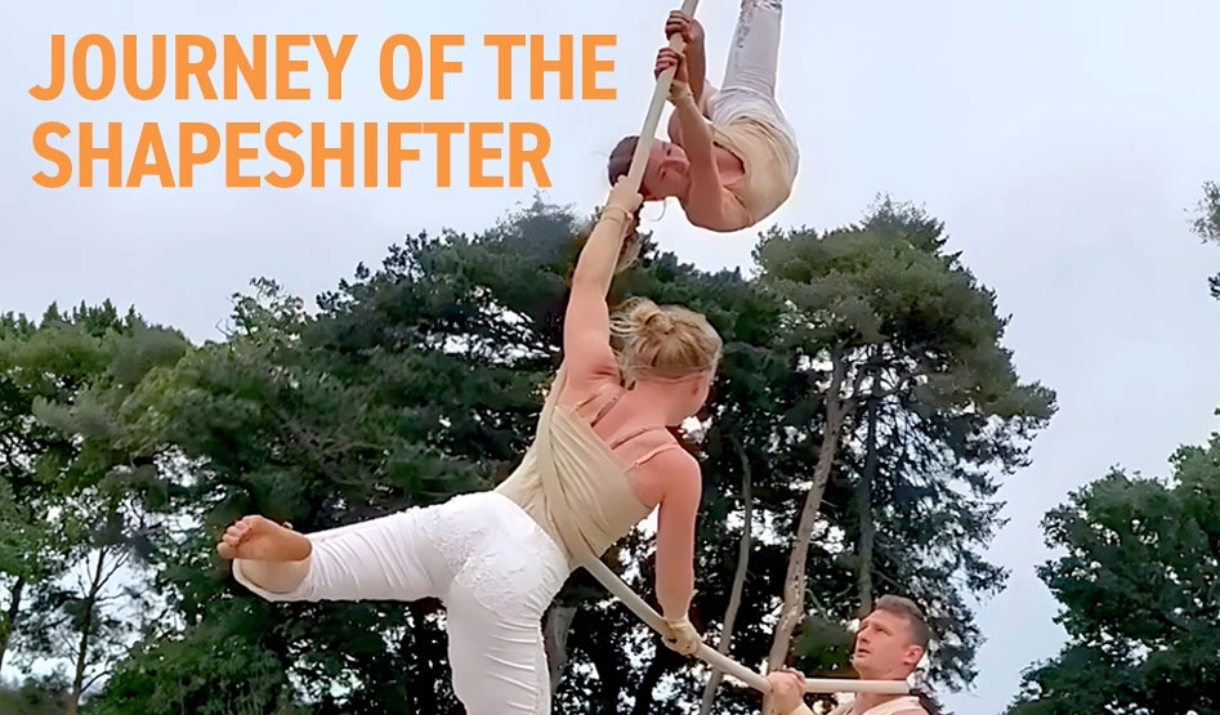 Journey of the Shapeshifter - performing artists swing on a rope