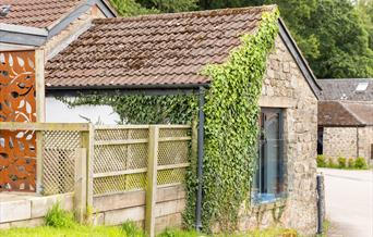 The rustic ivy-covered exterior of the Blorenge cottage