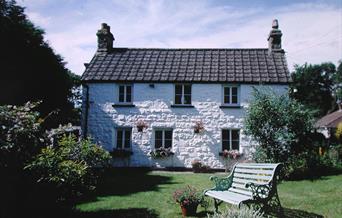 The garden is sheltered and fenced for the safety of children and pets