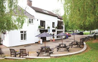 Ample seating on the bank of the Wye