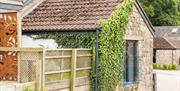 The rustic ivy-covered exterior of the Blorenge cottage