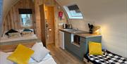 Bracelands campsite glamping pod inside cosy bed