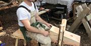 Shavehorse making in woodlands near Usk Monmouthshire