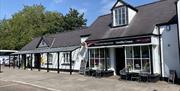 Chepstow Tourist Information Centre exterior of building next to carpark and chepstow castle