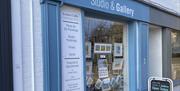 Louise Collis  Studio & Gallery shop in Abergavenny blue painted wooden window frame with artwork in window