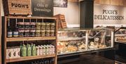 The Garden Kitchen By Pugh's  gourmet deli and artisan food hall with wooden clad walls