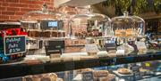 The 19th Bar & Lounge with cakes and sausage rolls