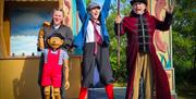 actors cheer and be silly for crowd at Abergavenny castle open air theatre