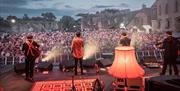 rusty shackle live at caldicot castle crowd and castle in background