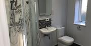 The bathroom in the Skirrid, with shower, sink and toilet