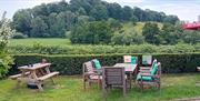 The Halfway Tal-y-coed outside beer garden area grass and fields with mature trees