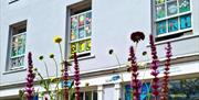 Pawb Arts in Abergavenny outside windows saying ART ART ART