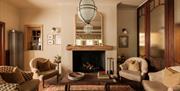 The Royal George sitting room lounge, sofas and stylish decorations