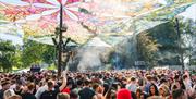 Into The Woods Festival UK  party goers dance in sunshine