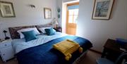 Box Barn Raglan accommodation showing bedroom double bed in monmouthshire rural location