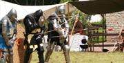 Knights in armour archery