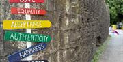 sign at Abergavenny Pride saying - Love, Equality, acceptance, authenticity, happiness, respect