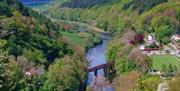 Fabulous views around monmouthshire showing river and green hill covered in trees