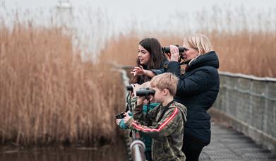 Family on a bridge -  Image credit: Dakeney Fox Photography