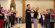 Strictly Pros Kai Widdrington and Nadiya Bychkova teaching at Donaheys Dancing With The Stars Weekend