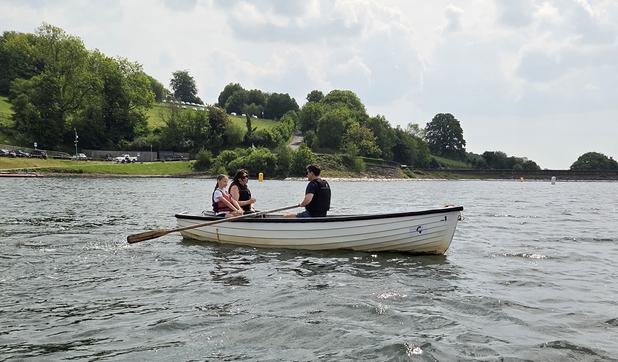 Rowing boat at Llandegfedd Lake with family in. Rowing boat at Llandegfedd Lake with family in.