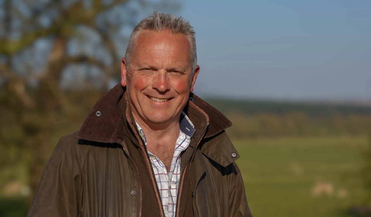 Jules Hudson: Wild at Heart portrait of man in field wearing country outdoor clothing Jules Hudson: Wild at Heart portrait of man in field wearing country outdoor clothing