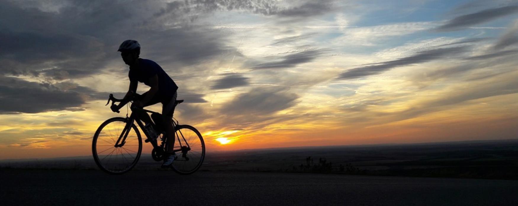 Cyclists at sunset