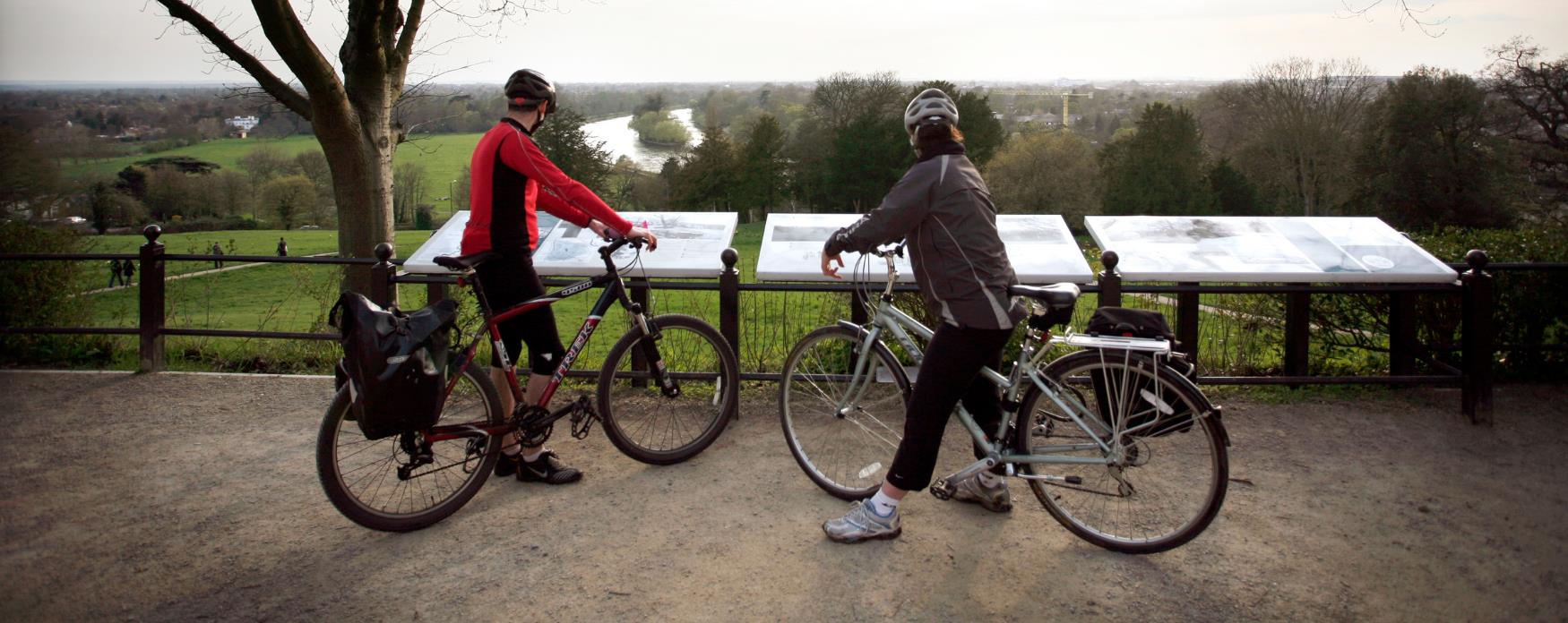 A picture of two people touring Richmond upon Thames on bike