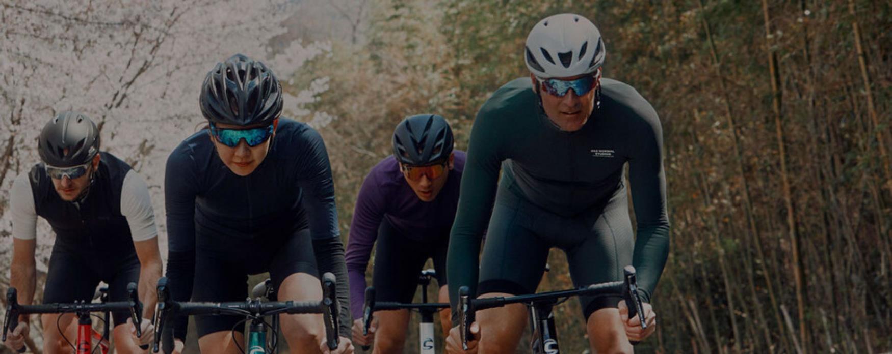 A picture of a group of cyclist riding around London