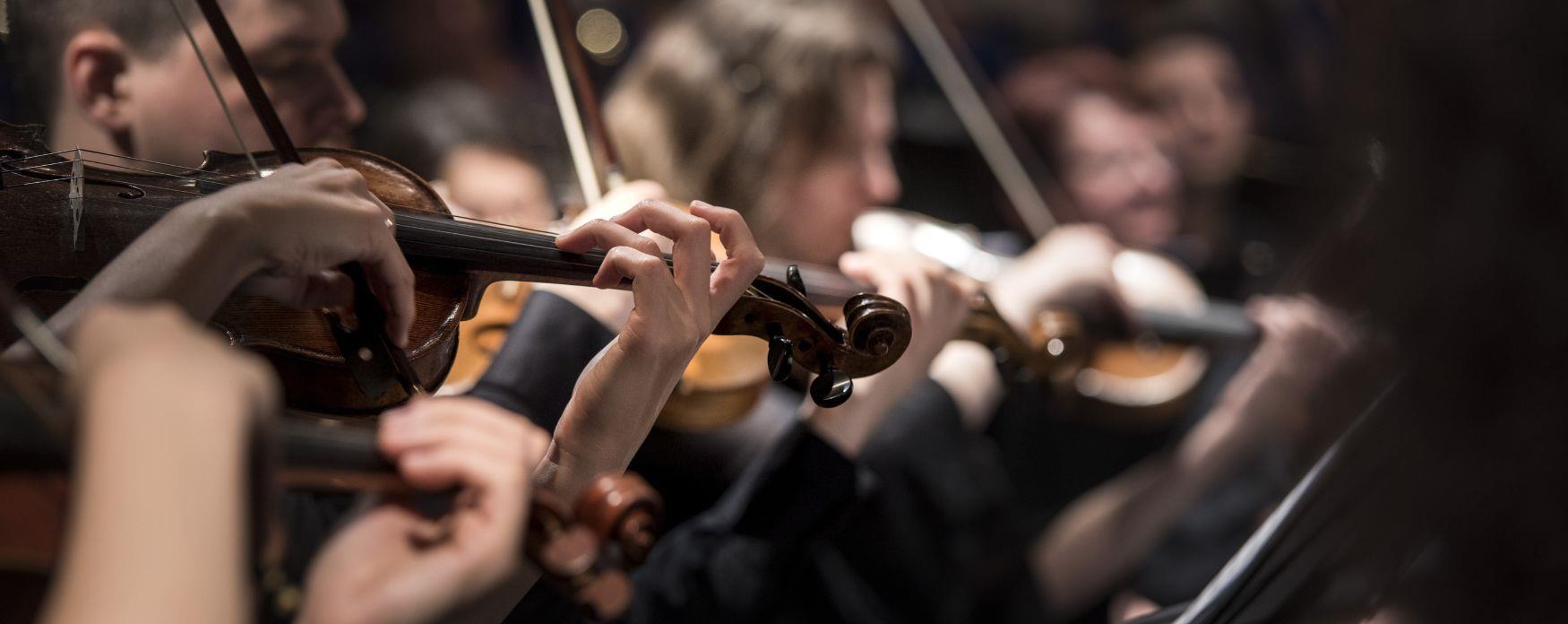 Generic image of people playing on trumpets