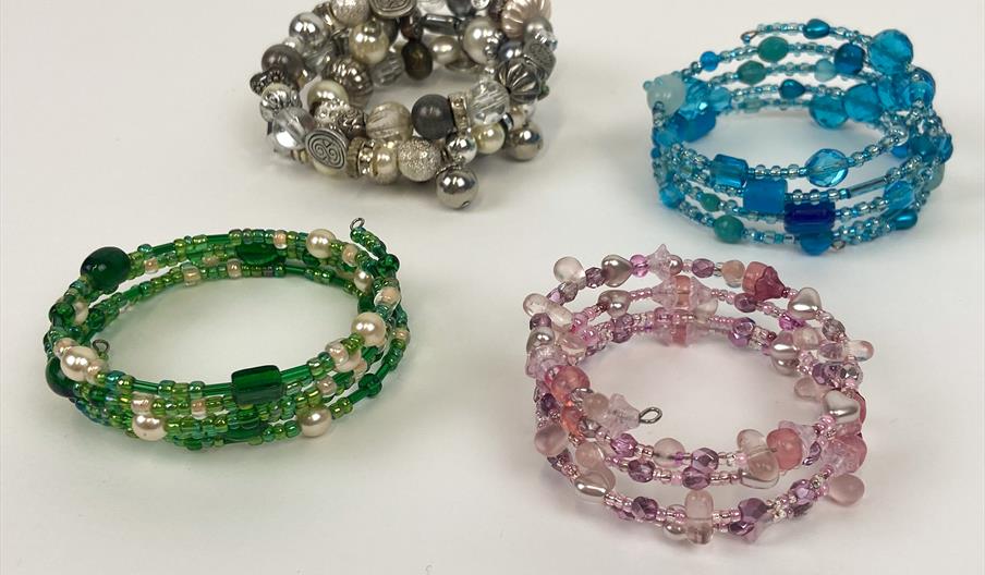 Four beaded bracelets