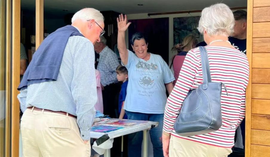 Artist Laura Parker in her garden studio