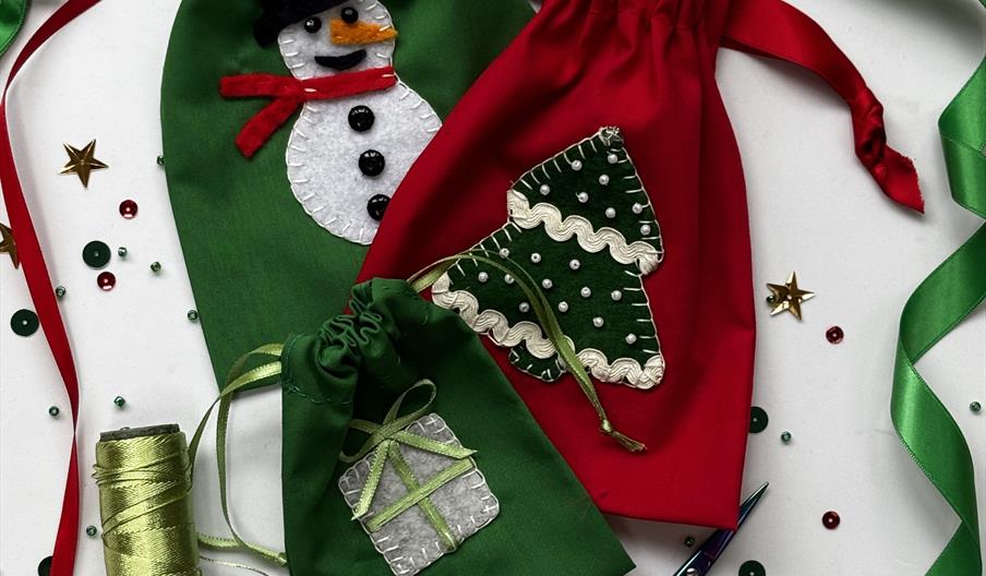 Three decorated gift bags