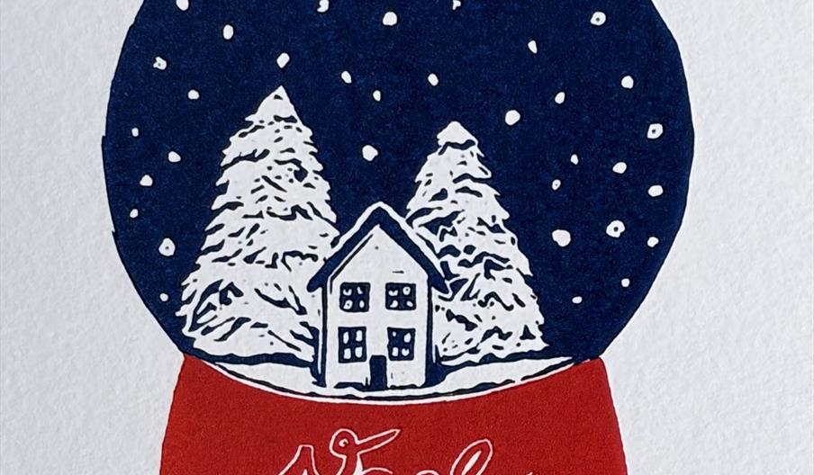 Artwork print of a snowglobe that has a house and christmas trees