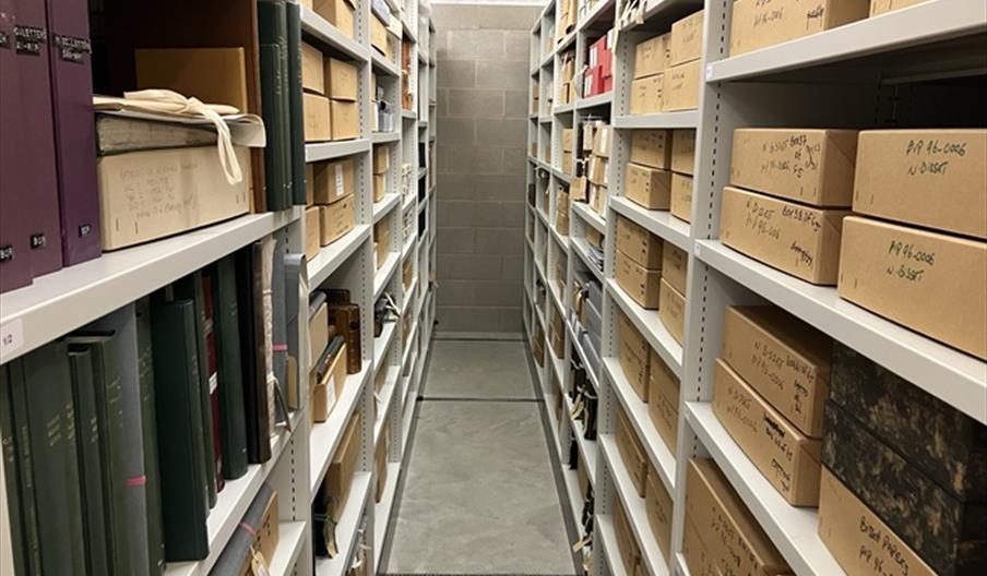 Photograph of shelves in the archives store at RBG Kew
