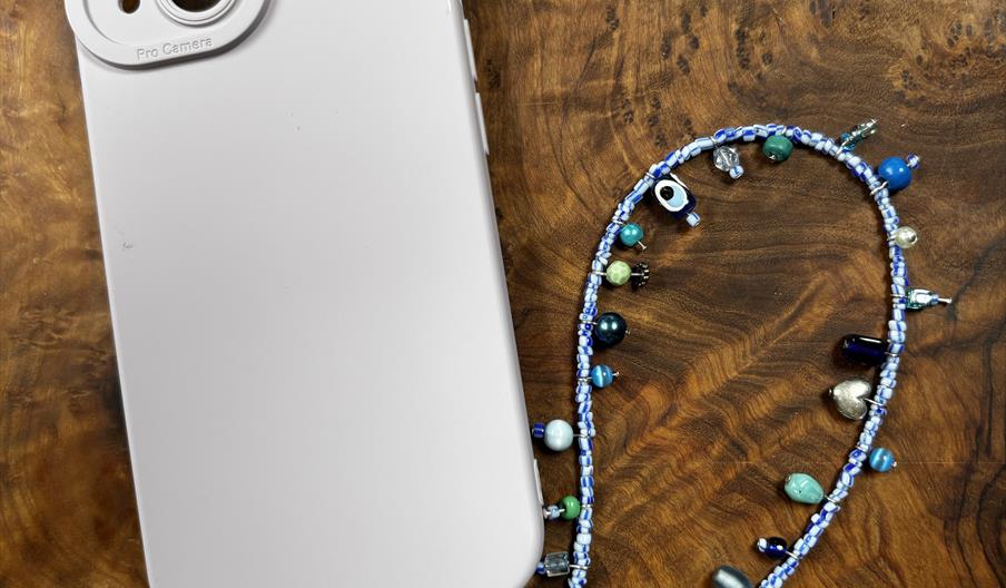 Phone case with charm