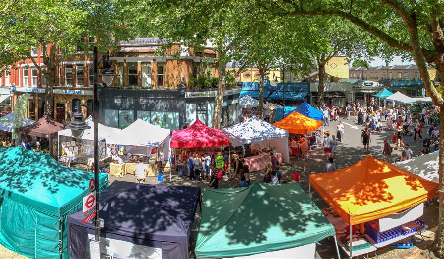 A host of colourful stalls selling fine food & crafts