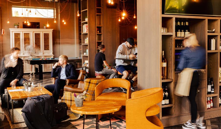 People sitting at The Crane Tap for post-work drinks