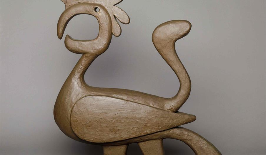 Sculpture of a savacou made out of wood