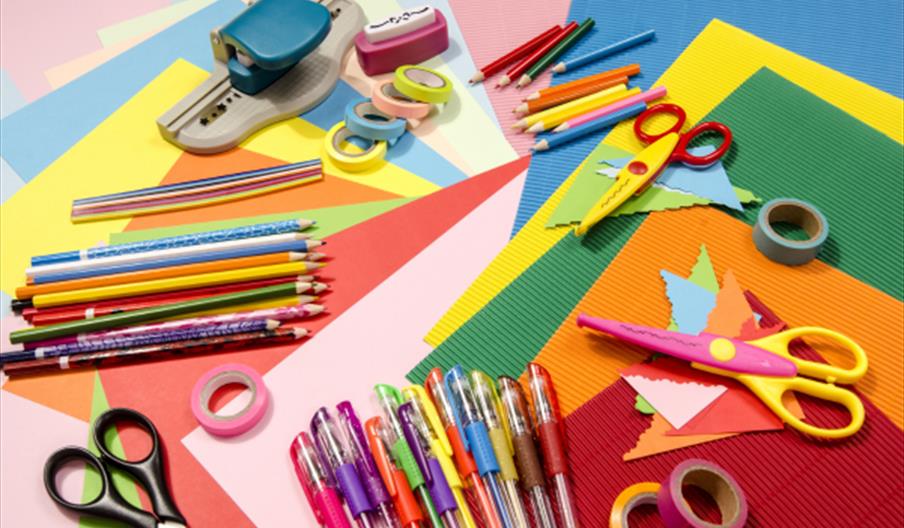 craft tools on a rainbow background